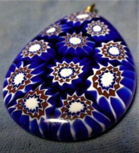 Millefiori teardrop-shaped pendant, blue background