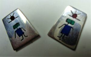 Silver earrings, inlaid primitive person, sun over head