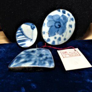 3 pottery shards in jewelry